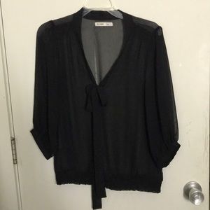 Sheer black blouse